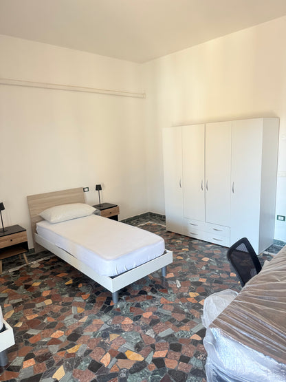Stanza doppia Via Piovese 105